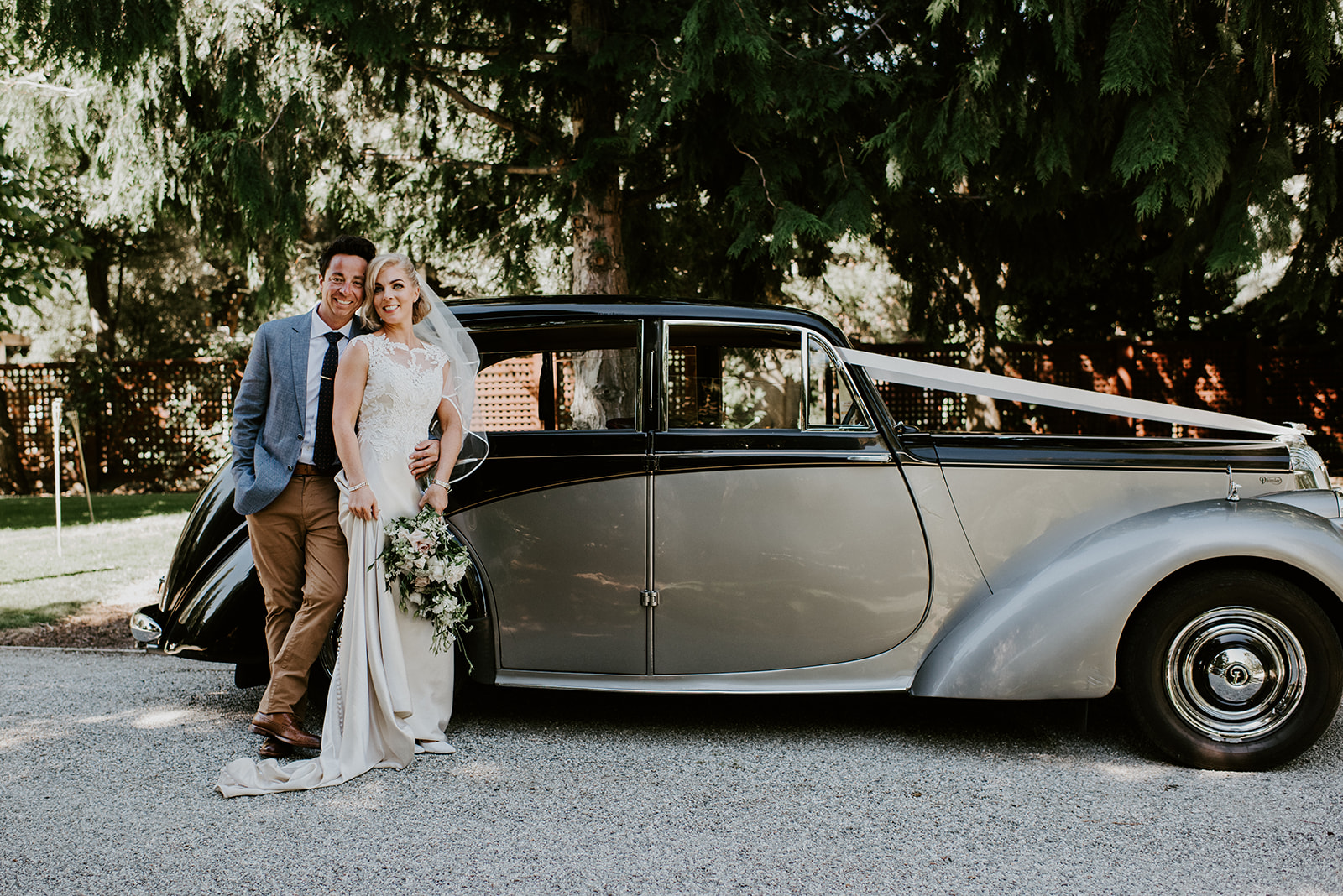 Elopement Packages Queenstown- Classic car hire for your wedding day, couple standing in front of their wedding car